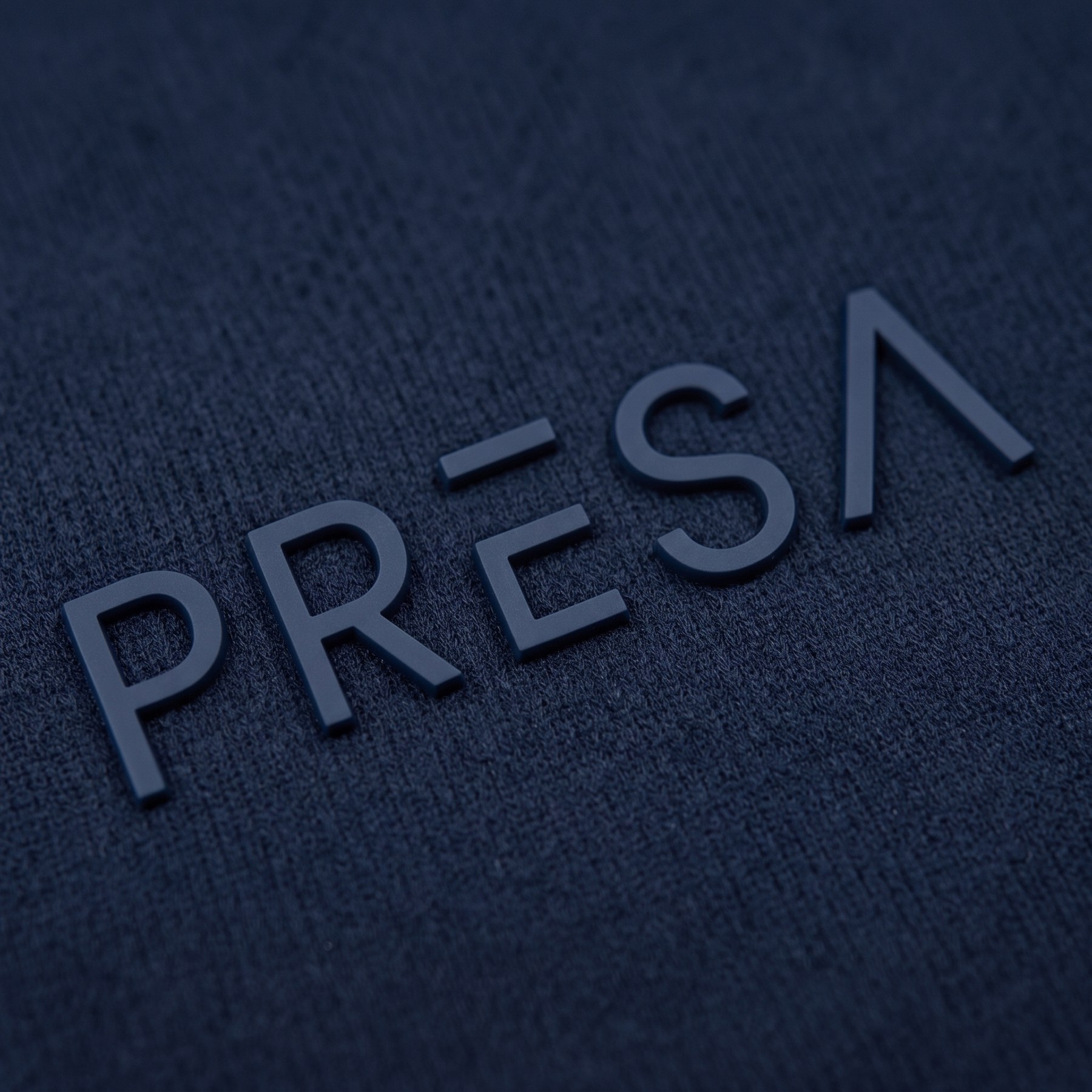 PRESA raised logo detail, navy